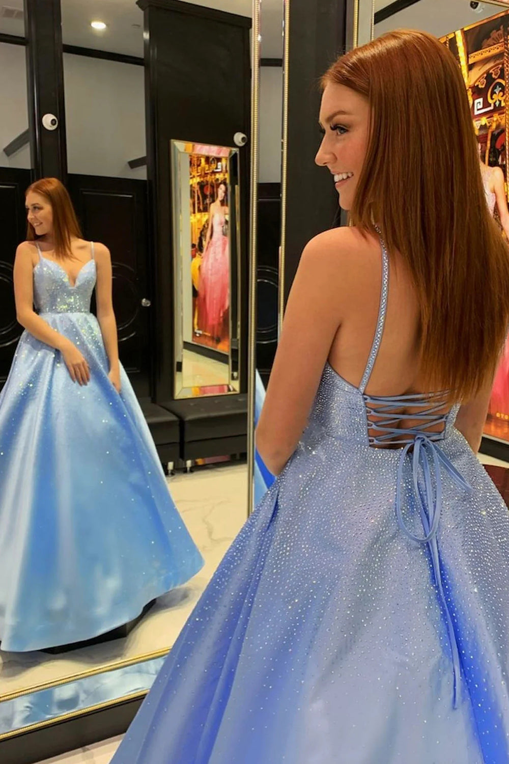 Long Blue Prom Dress with Spaghetti Straps and Criss Cross Back in A-Line Silhouette