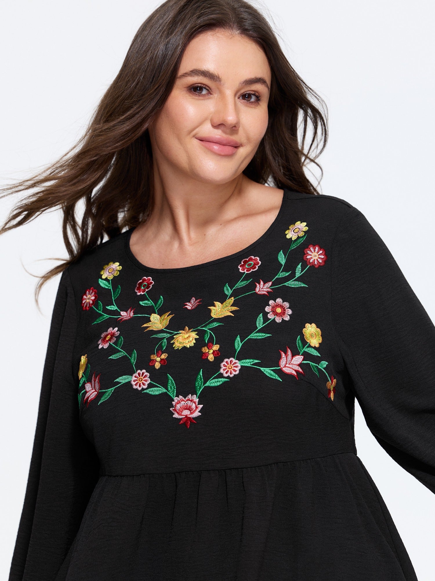 Floral Embroidered Round Neck Peplum Blouse