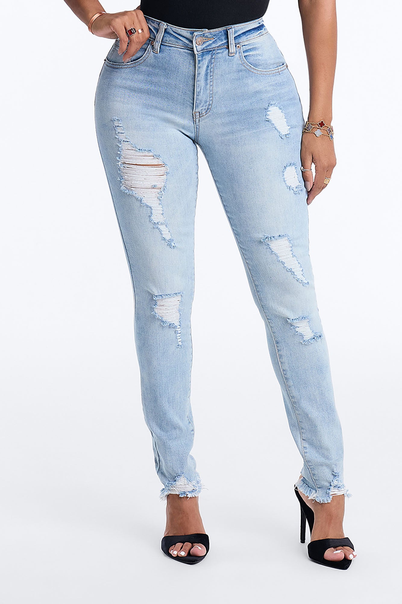 All Caught Up Ripped Raw Hem Skinny Jeans - Light Wash