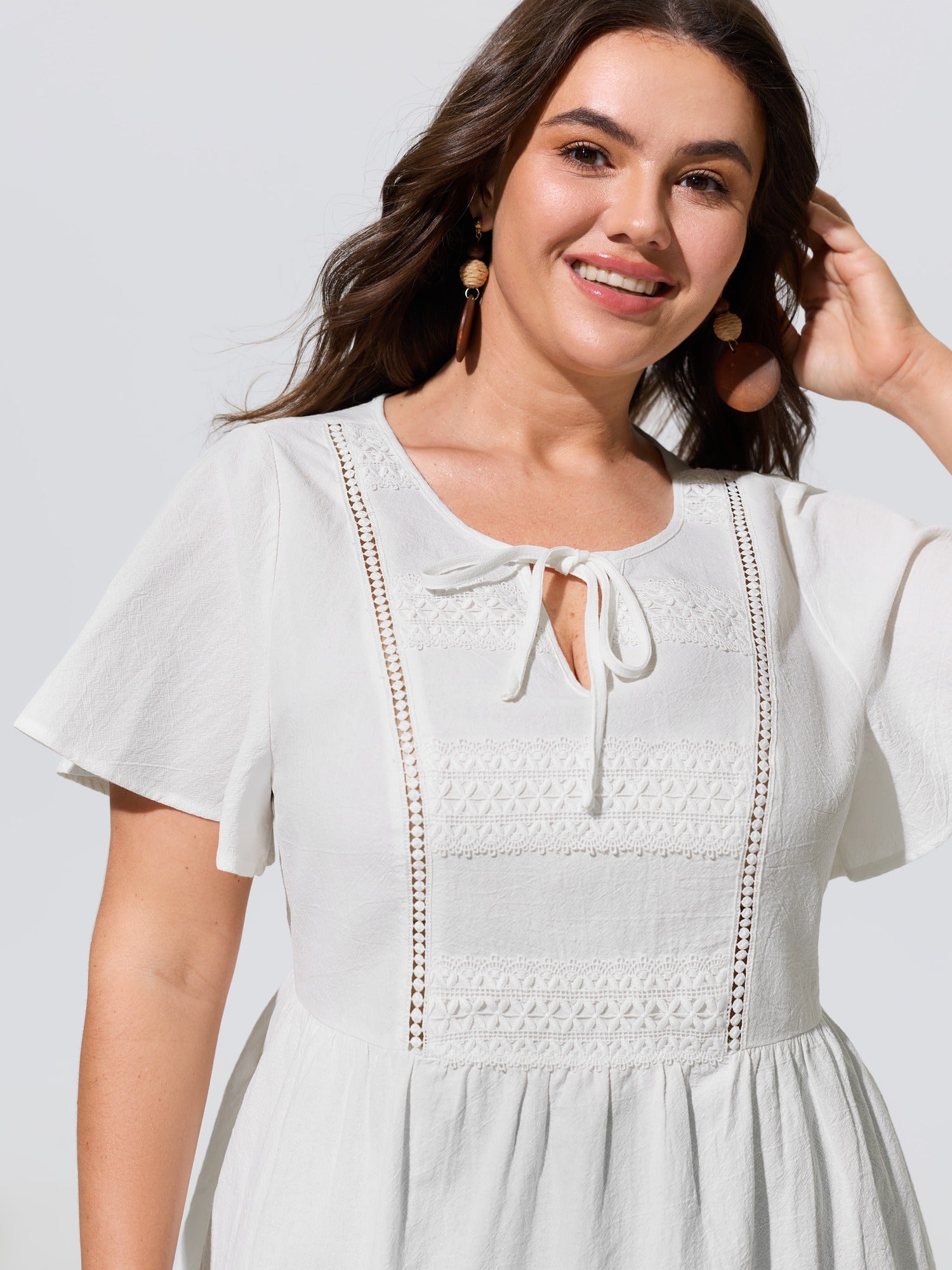 Cotton V Neck Flutter Sleeve Peplum Blouse