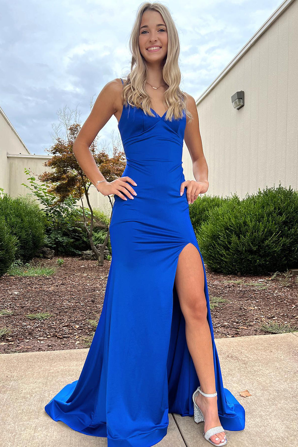 Long Blue Prom Dress Featuring Spaghetti Straps and a Slit