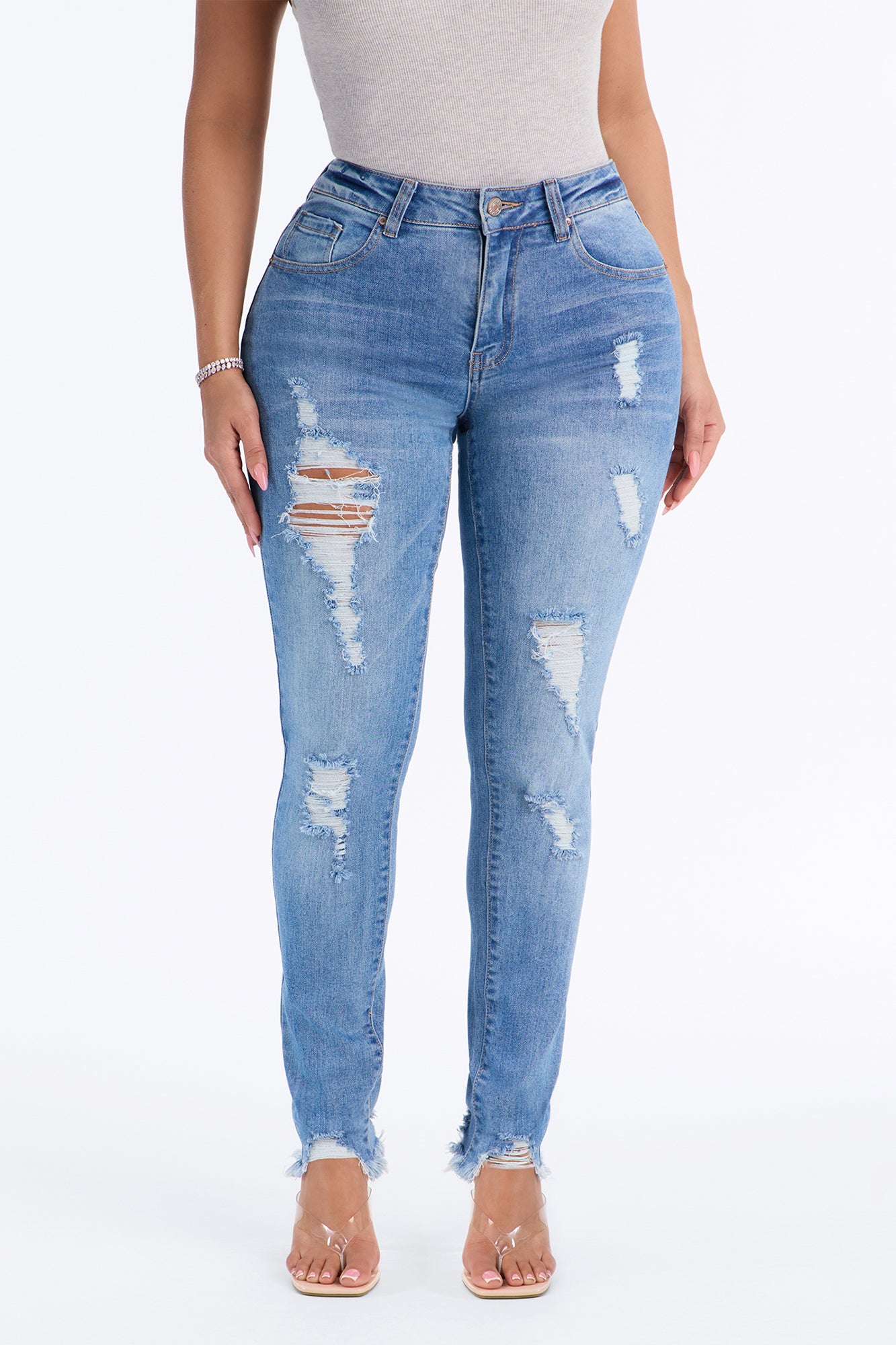 All Caught Up Ripped Raw Hem Skinny Jeans - Medium Wash