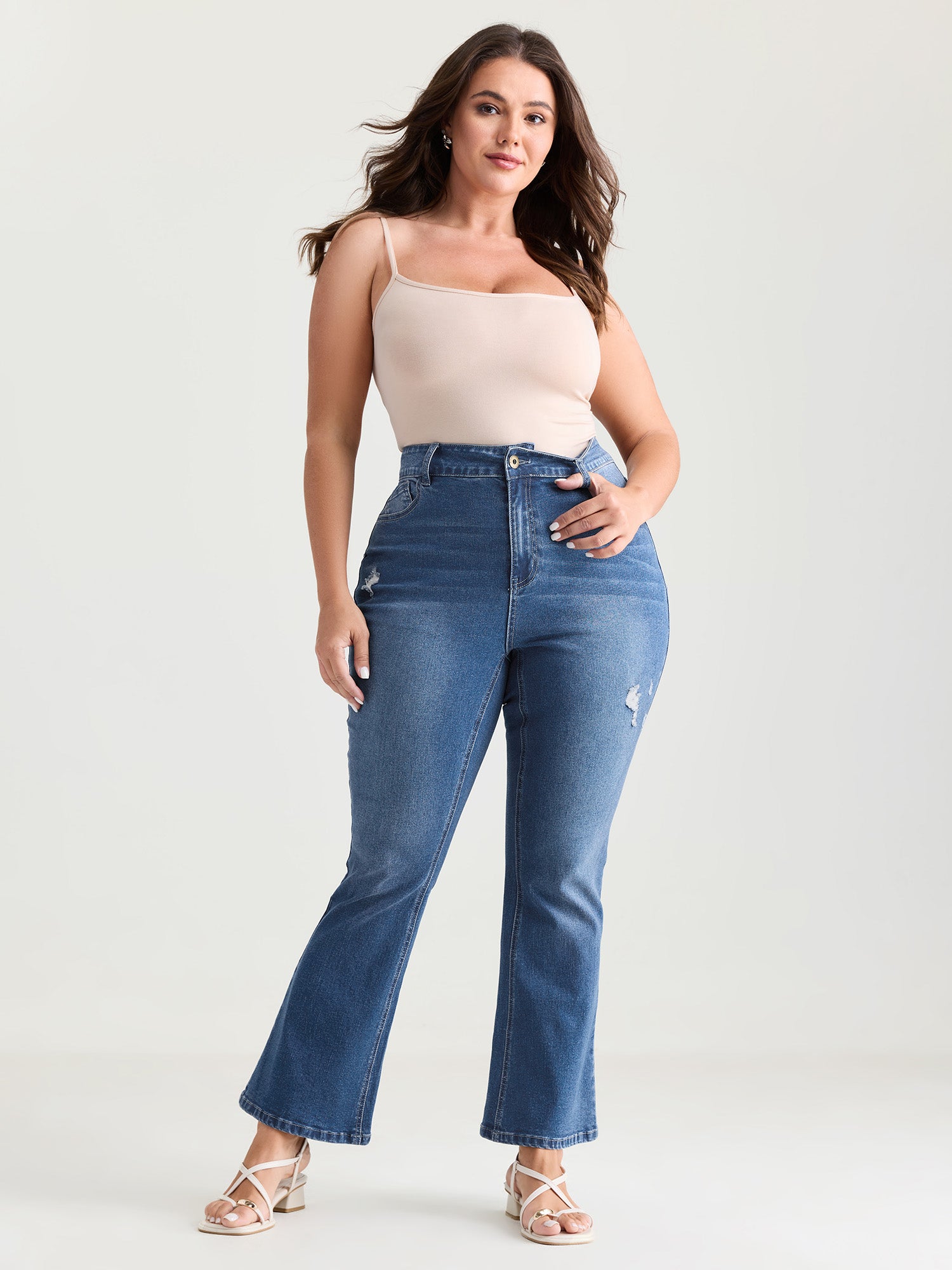 Thigh-Friendly Washed And Distressed Flare Jeans